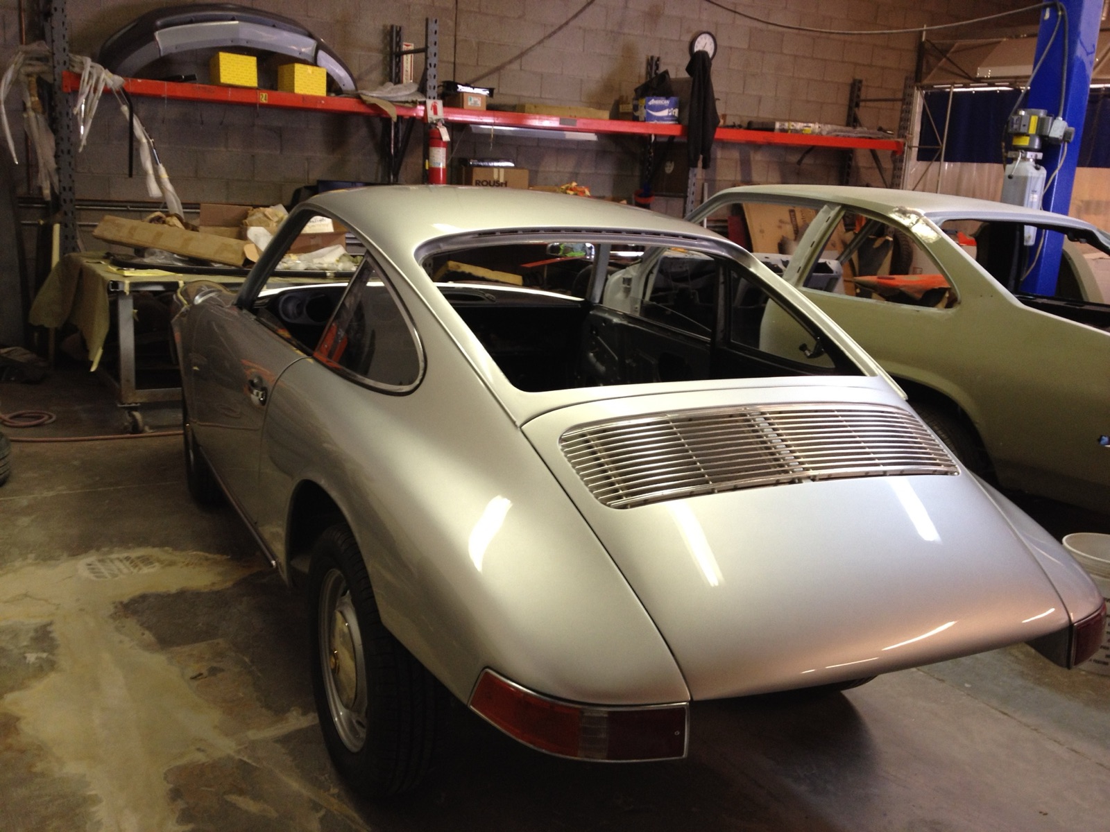 The 912 in fresh silver paint, back on its wheels at AZ Street Customs